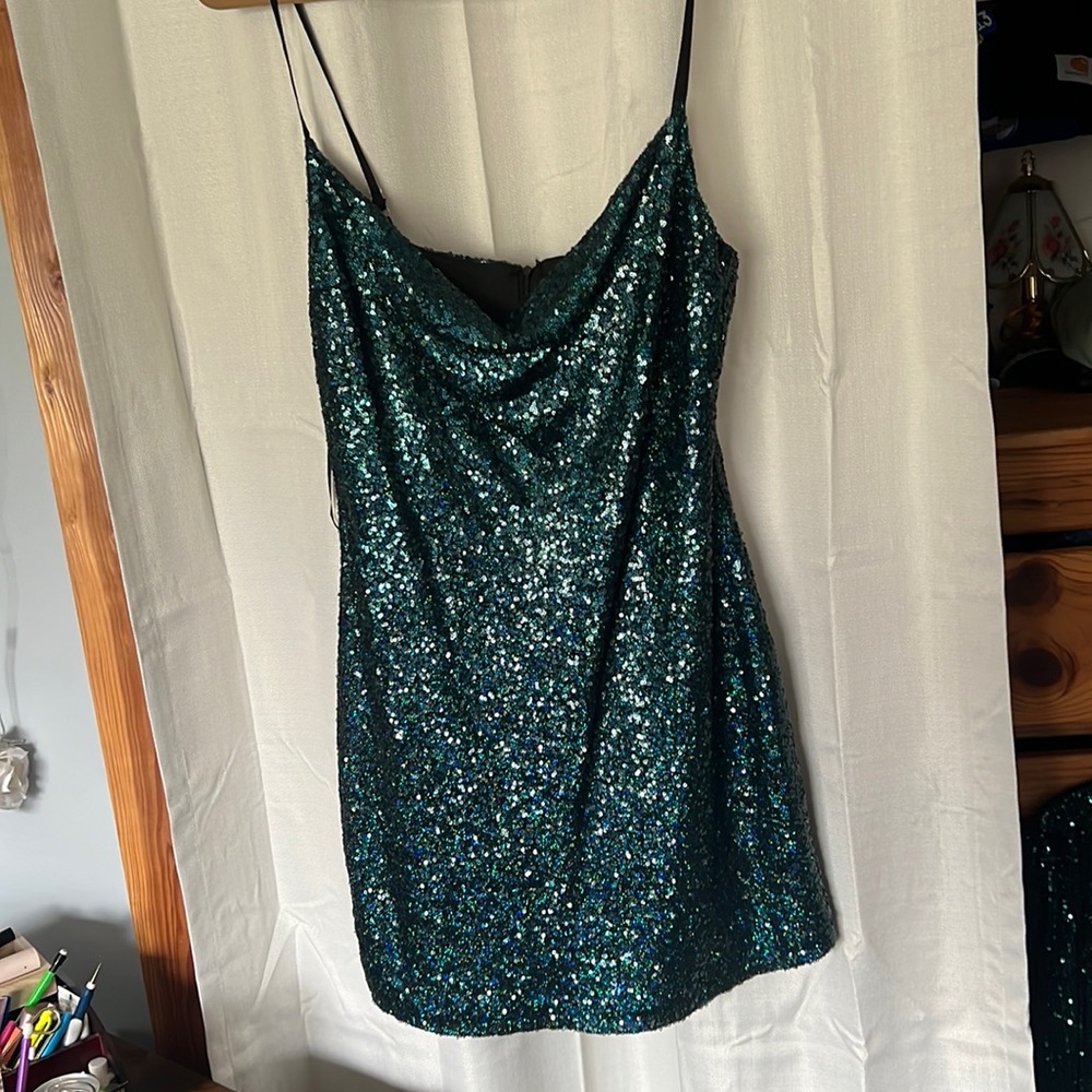 A very pretty dress and very flattering on the body